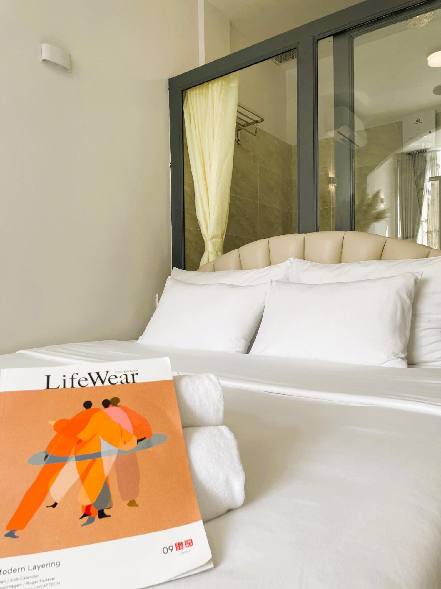 6Even Hotel - Have A Staycation In The Cafe Apartments Building 胡志明市 外观 照片