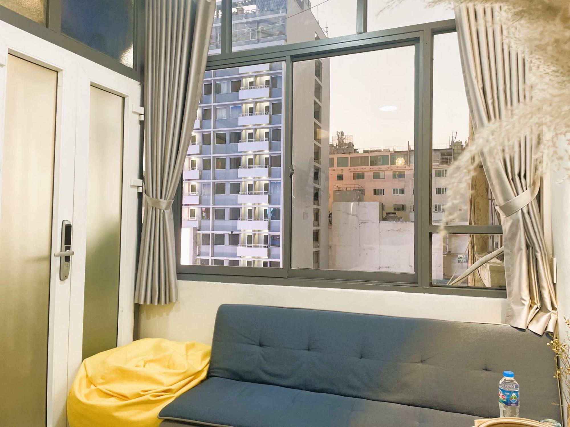 6Even Hotel - Have A Staycation In The Cafe Apartments Building 胡志明市 外观 照片