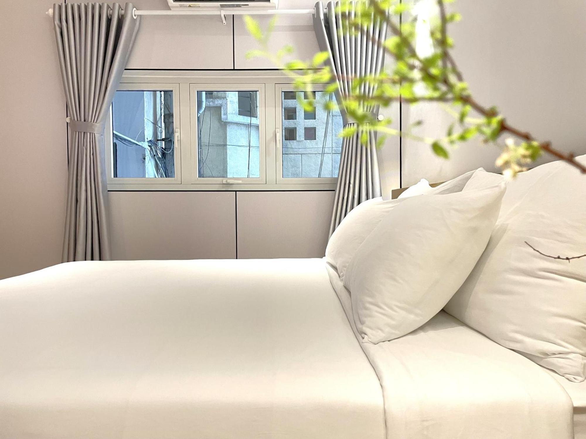 6Even Hotel - Have A Staycation In The Cafe Apartments Building 胡志明市 外观 照片